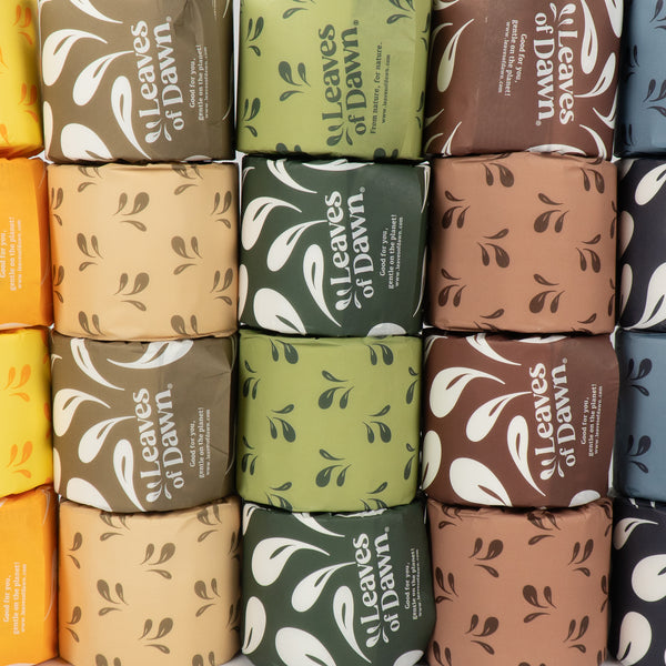 Leaves of Dawn premium 3-ply bamboo toilet paper rolls, packshot, showing their packaging. 
